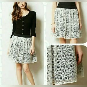 Stand out in this HD in Paris Ninette small white lace skirt over black netting.